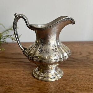Vintage Silver Plated Creamer: Footed Pitcher with Aged Patina